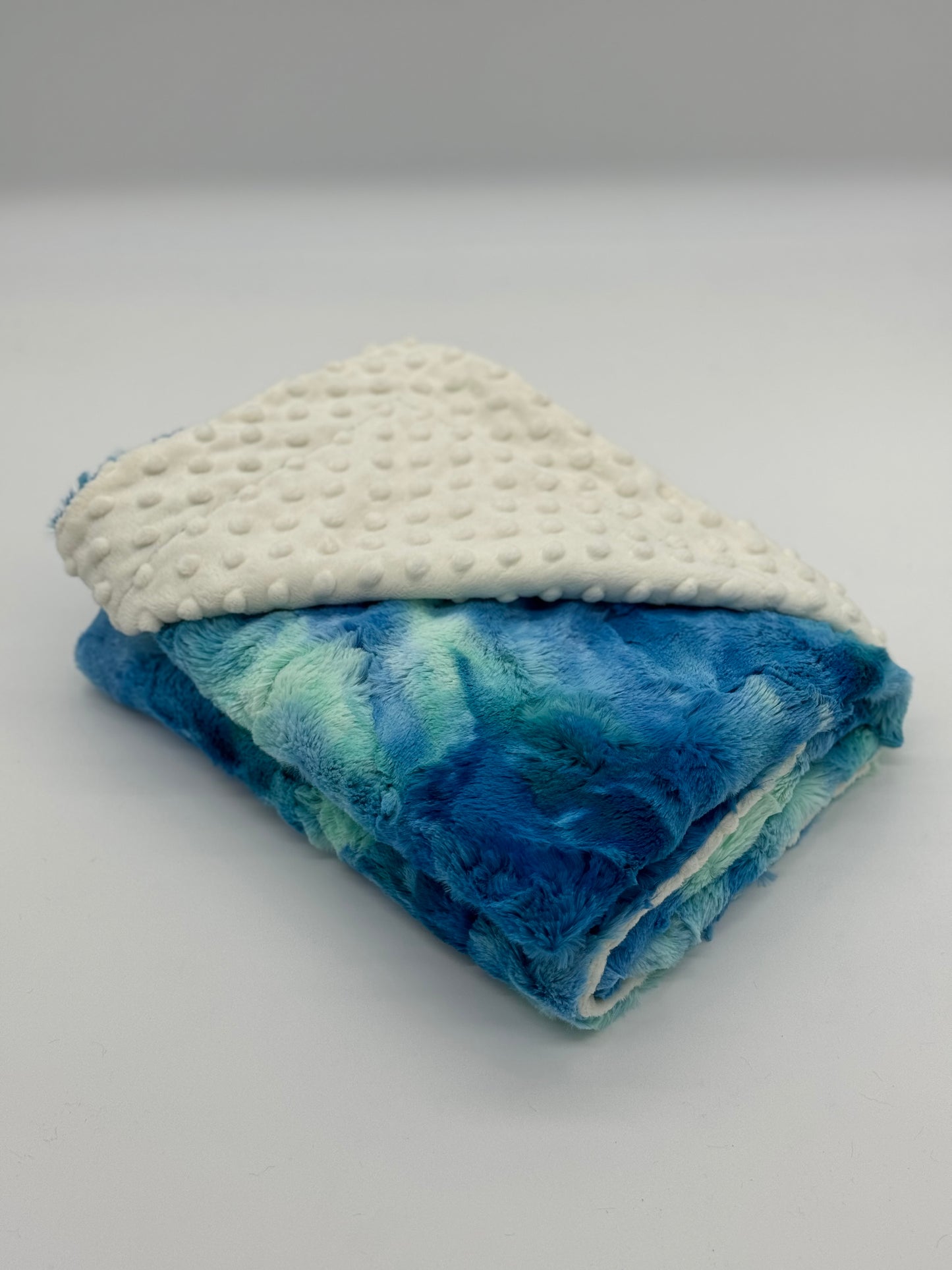 Blue Glow & Ivory Baby Blanket